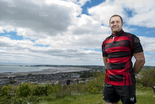 220513 - Ospreys - Pictured with Swansea Bay in the background is James King in Mold RFC kit
