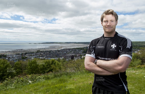 220513 - Ospreys - Pictured with Swansea Bay in the background is Jonathan Spratt in Neath Athletic RFC kit