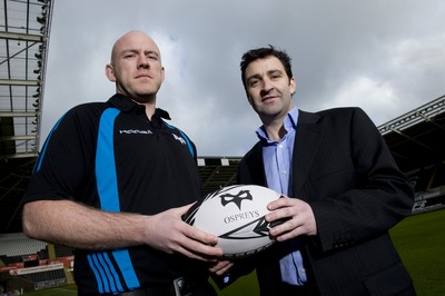 150212 - Ospreys New Head Coach -Steve Tandy after being named as the new Ospreys head coach with Ospreys Chief Operations Officer Andrew Hore(R)