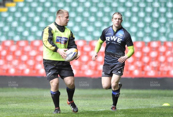 290313 - Ospreys Training - Captains Run - Ospreys Dimitri Arhip, left, and Tom Isaacs at the Captains Run,