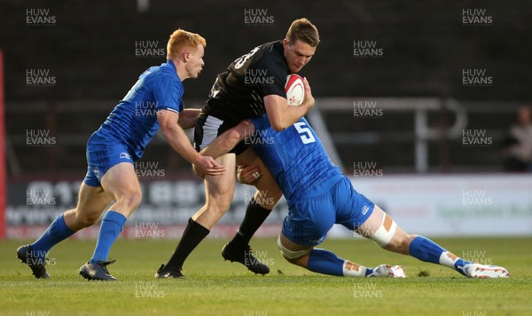 200919 - Ospreys Development v Leinster A - Celtic Cup - Tom Williams of Ospreys is tackled by Ryan Baird of Leinster