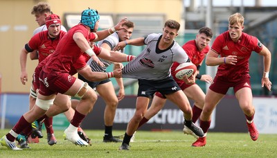 150918 - Ospreys Development v Munster A - Celtic Cup - Dewi Cross of Ospreys is tackled by Jeremy Loughman of Munster