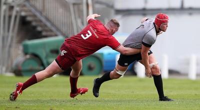 150918 - Ospreys Development v Munster A - Celtic Cup - Jack Pope of Ospreys is tackled by Brian Scott of Munster