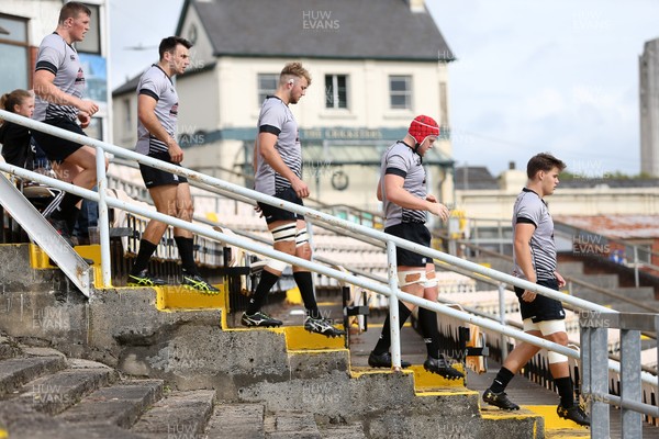 150918 - Ospreys Development v Munster A - Celtic Cup - Ospreys Players walk down the steps to the pitch