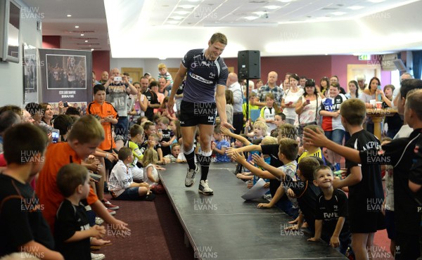 080814 - Ospreys Kit Launch -Dan Biggar models the new Ospreys home kit during the kit launch