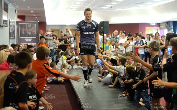 080814 - Ospreys Kit Launch -Dan Biggar models the new Ospreys home kit during the kit launch