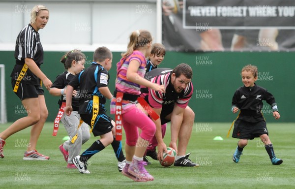 040812 - Ospreys Open Day -Ryan Bevington plays tag rugby with youngsters