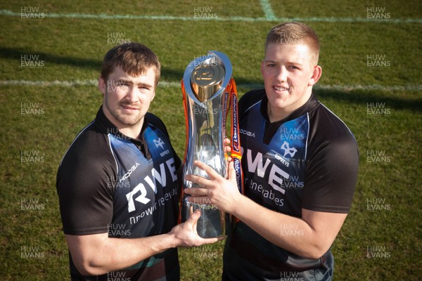 190213 - Ospreys team members Morgan Allen and Lloyd Peers with the RaboDirect PRO12 trophy