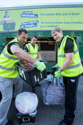 290714 -  Ospreys, Joe Bearman, Tom Habberfield and  Jonathan Spratt help out on the council's household recycling collection in Maesteg 