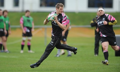 06.04.10 - Ospreys Rugby Training - Dan Biaggar in action during training. 