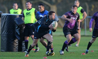 15.11.11 - Ospreys Rugby Training - Rhys Webb gets past Kahn Fotuali'i during training. 