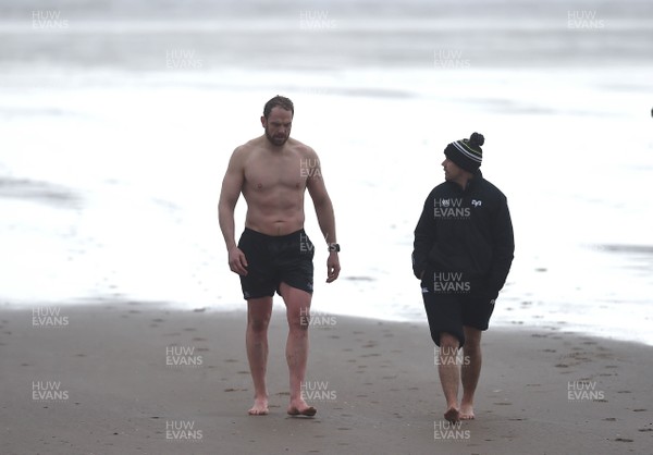 150118 - Ospreys Rugby Sea Recovery - Alun Wyn Jones and Gruff Rees of Ospreys after coming out of the sea at Aberavon beach ahead of their qualifying game against Clermont Auvergne