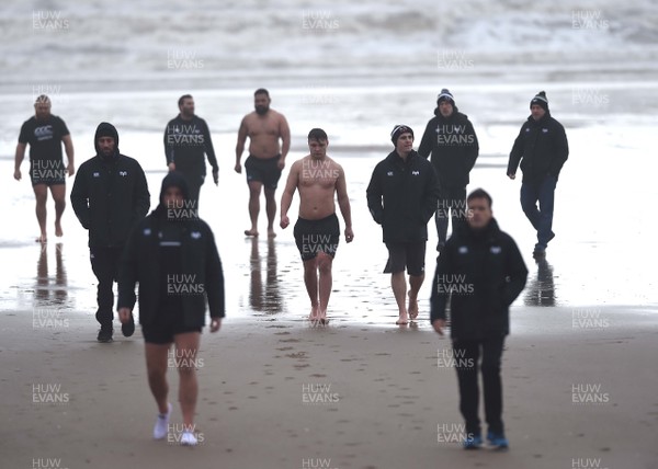150118 - Ospreys Rugby Sea Recovery - Will Jones of Ospreys after coming out of the sea at Aberavon beach ahead of their qualifying game against Clermont Auvergne