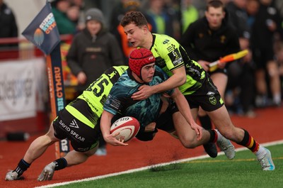 160225  Ospreys U18s v Dragons U18s, WRU Regional Age Grade Semi Final - Evan Jones of Ospreys is tackled by Harry Dawes of Dragons and Rhys Cole of Dragons