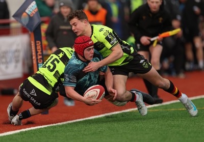 160225  Ospreys U18s v Dragons U18s, WRU Regional Age Grade Semi Final - Evan Jones of Ospreys is tackled by Harry Dawes of Dragons and Rhys Cole of Dragons