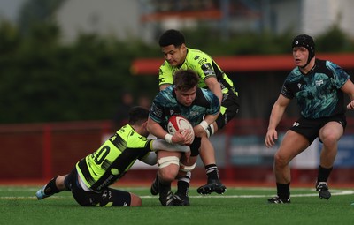 160225  Ospreys U18s v Dragons U18s, WRU Regional Age Grade Semi Final - Elis Cox of Ospreys takes on Morgan Cusack of Dragons