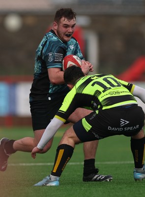 160225  Ospreys U18s v Dragons U18s, WRU Regional Age Grade Semi Final - Logan Lloyd of Ospreys takes on Morgan Cusack of Dragons