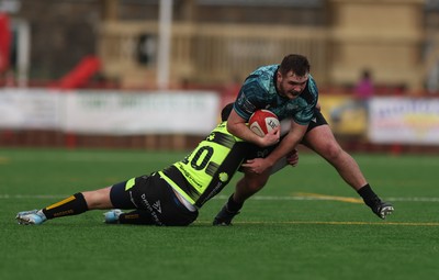 160225  Ospreys U18s v Dragons U18s, WRU Regional Age Grade Semi Final - Logan Lloyd of Ospreys takes on Morgan Cusack of Dragons