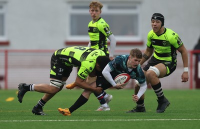 160225  Ospreys U18s v Dragons U18s, WRU Regional Age Grade Semi Final - Harrison Burke of Ospreys is tackled by Tiehi Chatham of Dragons