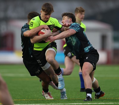 160225  Ospreys U18s v Dragons U18s, WRU Regional Age Grade Semi Final - Morgan Carter of Dragons takes on Caelan Carson-Jones of Ospreys and Logan Jones of Ospreys