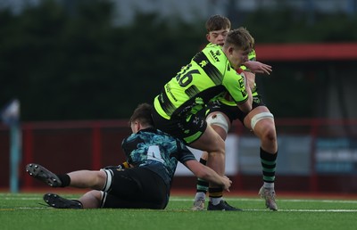 160225  Ospreys U18s v Dragons U18s, WRU Regional Age Grade Semi Final - Tiaan Hall of Dragons is tackled by Freddie Millward of Ospreys