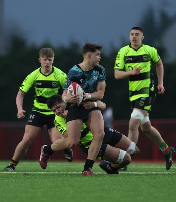 160225  Ospreys U18s v Dragons U18s, WRU Regional Age Grade Semi Final - Jack Hoskins of Ospreys is tackled by Elliot Beaven of Dragons