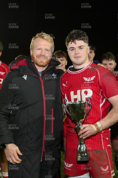 070224 - Ospreys v Scarlets - Regional U18 Championship - Richie Pugh presents the trophy to Scarlets Captain Tiaan Sparrow