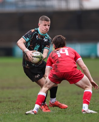 080226 - Ospreys U18 v Scarlets U18, WRU Regional Age Grade Championship - Dylan Quinn of Ospreys takes on Rhys Jones of Scarlets