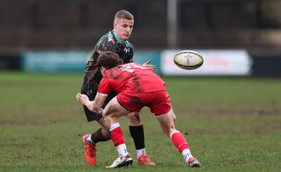 080226 - Ospreys U18 v Scarlets U18, WRU Regional Age Grade Championship - Dylan Quinn of Ospreys takes on Rhys Jones of Scarlets