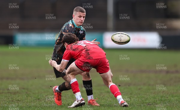 080226 - Ospreys U18 v Scarlets U18, WRU Regional Age Grade Championship - Dylan Quinn of Ospreys takes on Rhys Jones of Scarlets