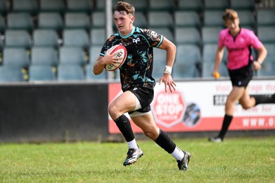 240825 - Ospreys U18s v Cardiff Rugby U18s - Cian Evans of Ospreys runs in to score a try 