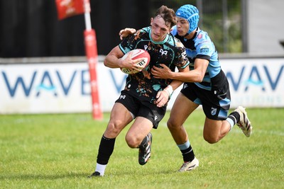 240825 - Ospreys U18s v Cardiff Rugby U18s - Cian Evans of Ospreys runs in to score a try 
