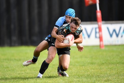 240825 - Ospreys U18s v Cardiff Rugby U18s - Cian Evans of Ospreys runs in to score a try 