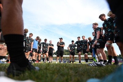 240825 - Ospreys U18s v Cardiff Rugby U18s - Ospreys team huddle at full time 