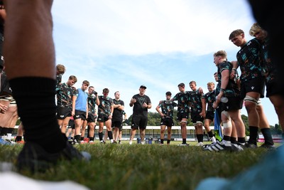 240825 - Ospreys U18s v Cardiff Rugby U18s - Ospreys team huddle at full time 
