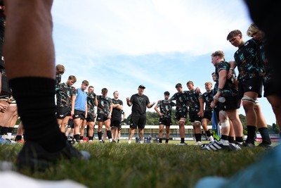 240825 - Ospreys U18s v Cardiff Rugby U18s - Ospreys team huddle at full time 