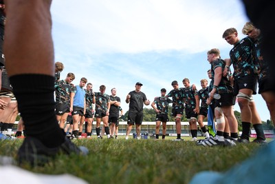 240825 - Ospreys U18s v Cardiff Rugby U18s - Ospreys team huddle at full time 