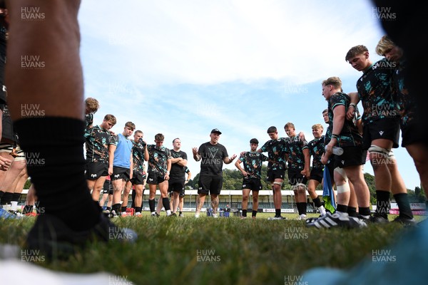240825 - Ospreys U18s v Cardiff Rugby U18s - Ospreys team huddle at full time 