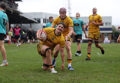 300826 - Ospreys U18s v Dragons U18s - RAG - Troy Raymond of Dragons celebrates scoring a try
