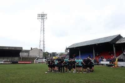 300826 - Ospreys U18s v Dragons U18s - RAG - Ospreys team huddle at full time
