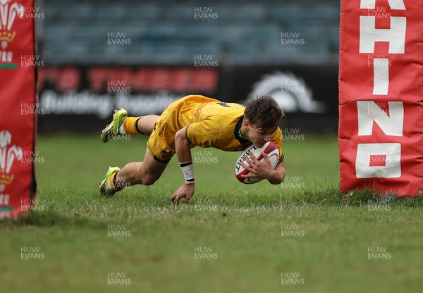 300826 - Ospreys U18s v Dragons U18s - RAG - Dylan Cole of Dragons runs in to score a try