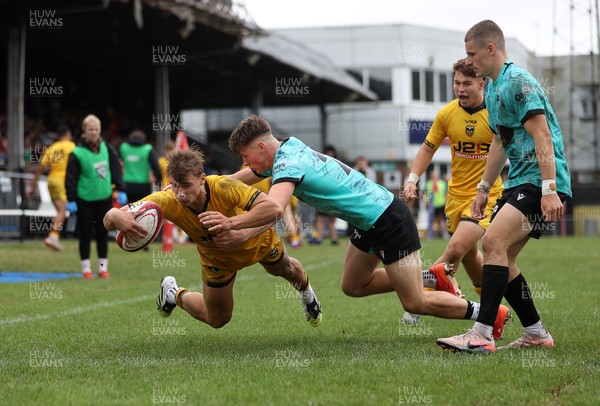 300826 - Ospreys U18s v Dragons U18s - RAG - Rhys Dyer of Dragons scores a try