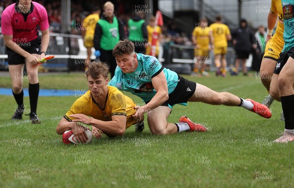 300826 - Ospreys U18s v Dragons U18s - RAG - Rhys Dyer of Dragons scores a try