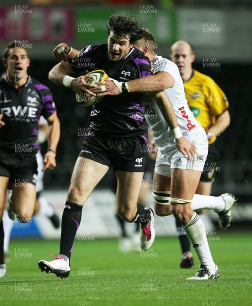 23.09.10 Ospreys v Aironi... Ospreys' Mike Phillips is tackled by Aironi's Gareth Krause. 