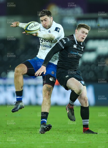 020218 - Ospreys v Bath Rugby, Anglo Welsh Cup - Matt Banahan of Bath and Dafydd Howells of Ospreys compete to win the ball