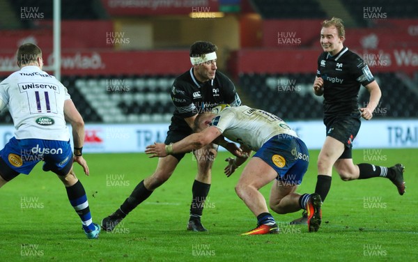 020218 - Ospreys v Bath Rugby, Anglo Welsh Cup - Kieron Fonotia of Ospreys is tackled by Will Hurrell of Bath