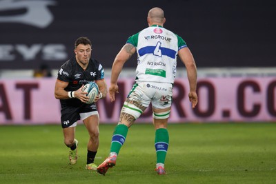 040323 - Ospreys v Benetton - United Rugby Championship - Luke Morgan of Ospreys  takes on Marco Lazzaroni of Benetton