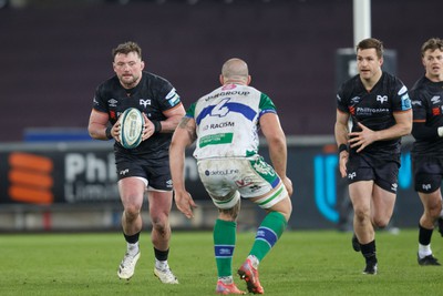 040323 - Ospreys v Benetton - United Rugby Championship - Sam Parry of Ospreys takes on Marco Lazzaroni of Benetton