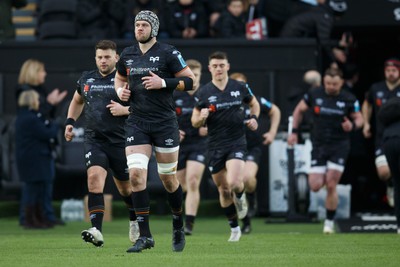 040323 - Ospreys v Benetton - United Rugby Championship - Dan Lydiate of Ospreys runs onto the pitch before the match