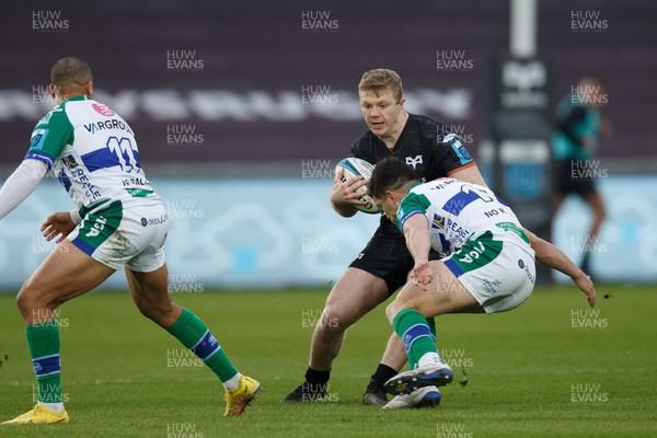 040323 - Ospreys v Benetton - United Rugby Championship - Keiran Williams of Ospreys is tackled by Joaquin Riera of Benetton